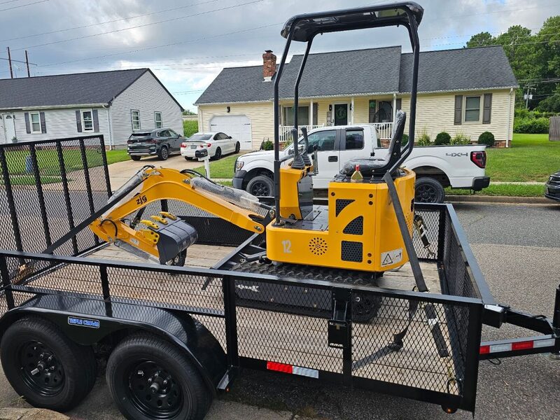 Mini excavator loaded on the trailer