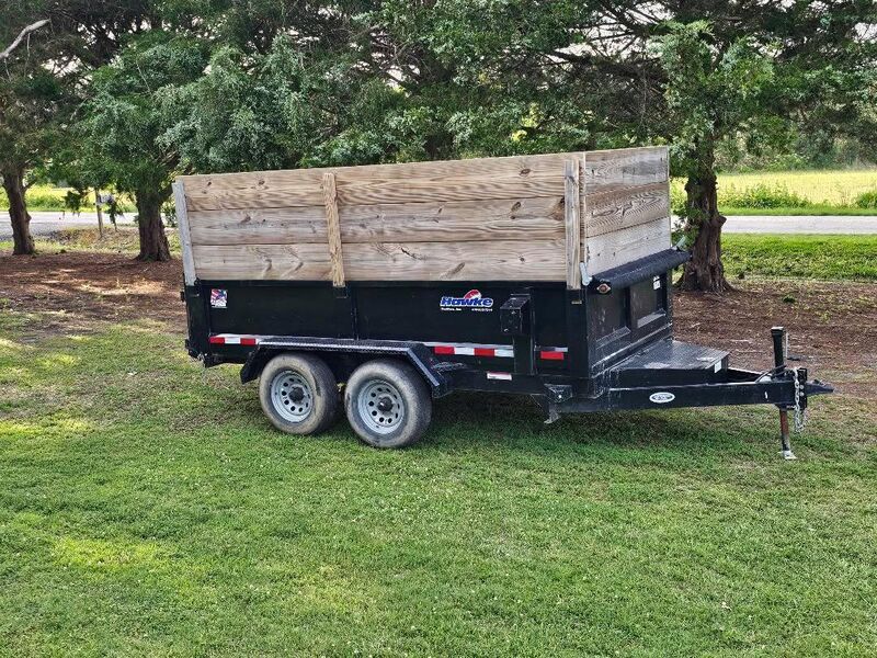 Dump trailer with high wooden sides